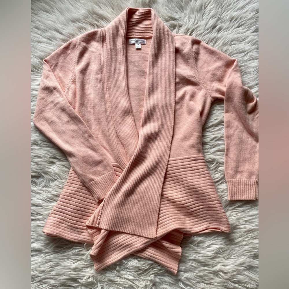 Super soft and so cute! Size petite medium sweater.